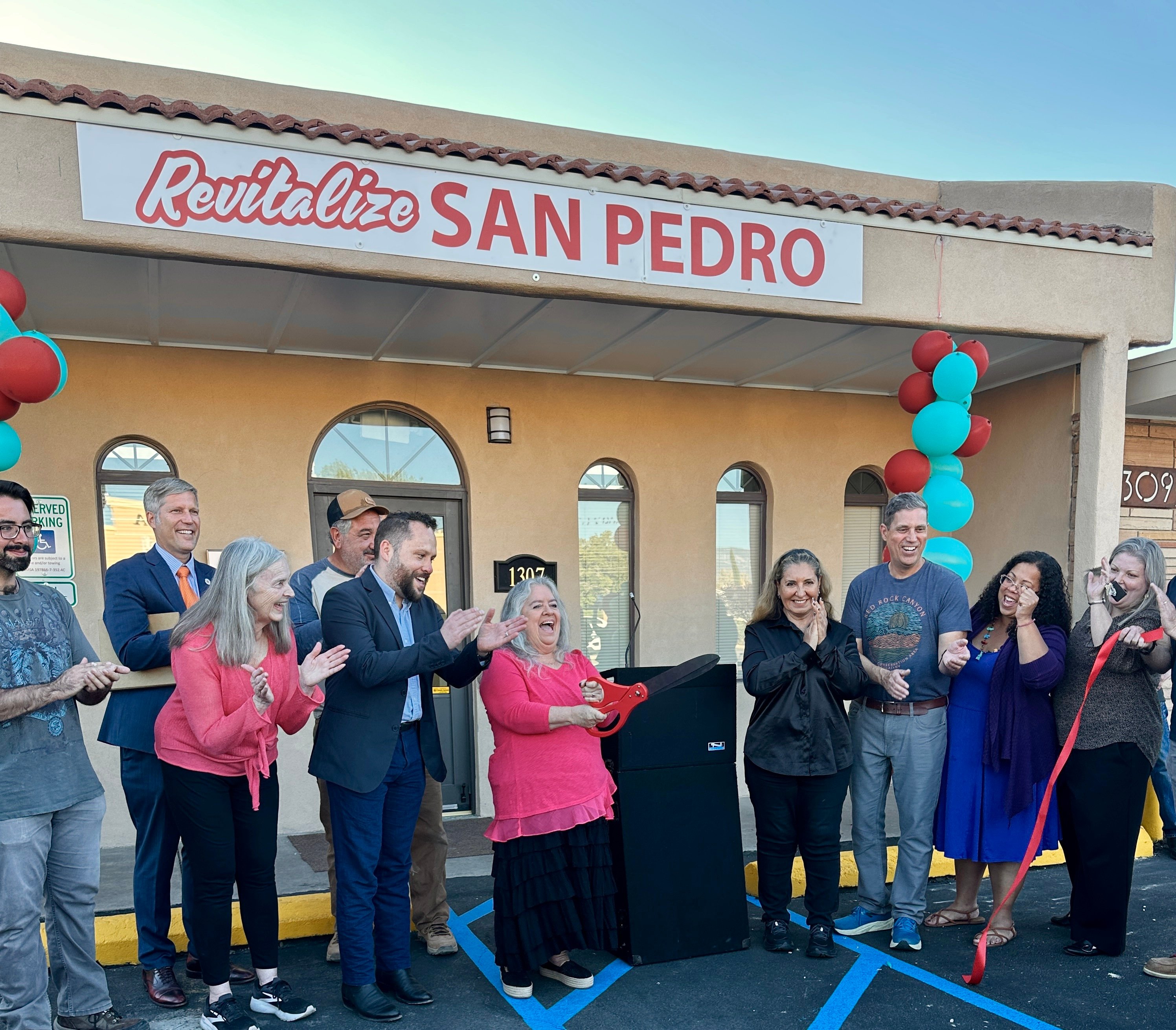 Board members, Executive Director Adrian Carver, Mayor Keller, and City Councilors celebrate the ribbon cutting at RSPP's first office. Board members, Executive Director Adrian Carver, Mayor Keller, and City Councilors celebrate the ribbon cutting at RSPP's first office.